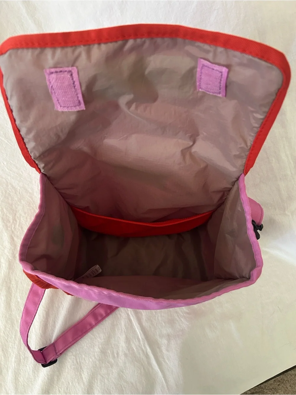 OMIE Pink Crossbody Bag with Red Trim